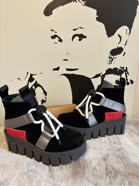 United Nude Black Suede Lace-Up Platform Boots with Gray Straps and Red Accent